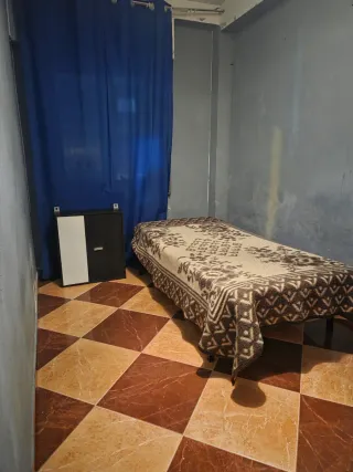 Habitación amueblada