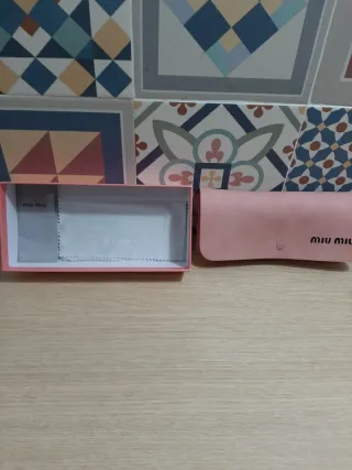 Gafas Miu Miu leopardo doradas