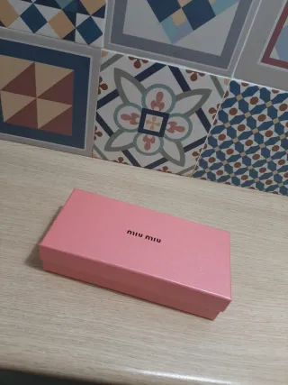 Gafas Miu Miu leopardo doradas