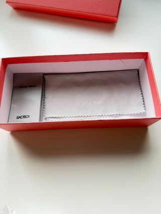 Gafas Miu Miu leopardo doradas