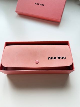 Gafas Miu Miu leopardo doradas