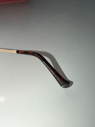 Gafas Miu Miu leopardo doradas