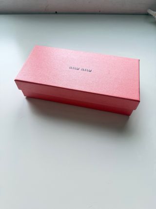 Gafas Miu Miu leopardo doradas