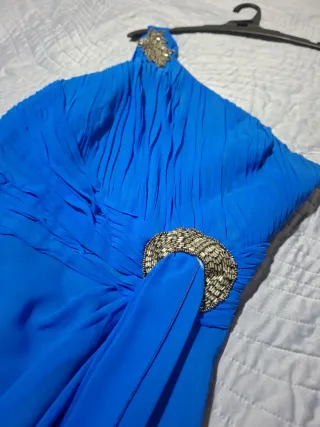 Vestido estilo griego azul, con un dolor brazo. Di