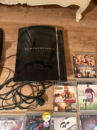 Consola PS3 + Volante y Juegos