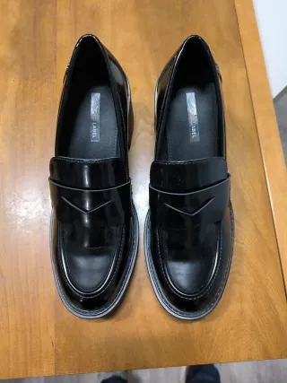 Zapatos negros sin estrenar