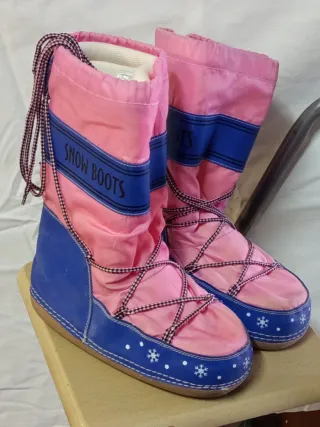Botas de nieve rosas y azules