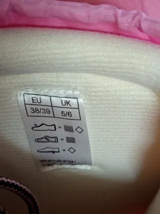 Botas de nieve rosas y azules