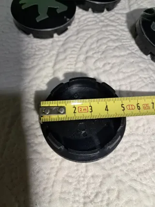 Tapabujes Llantas Peugeot (Set de 4)