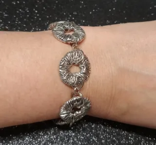 Pulsera rosquitos plateada