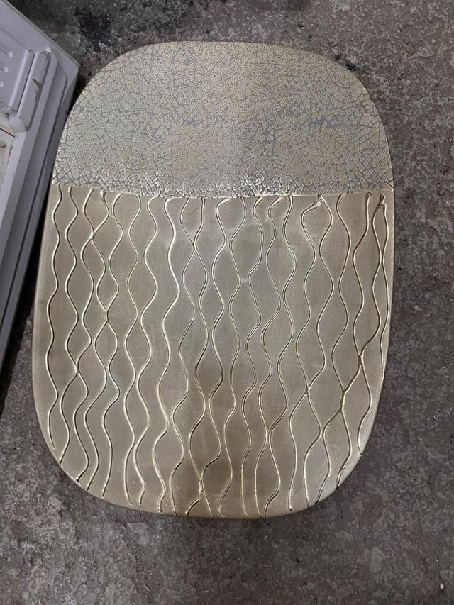 Centro de mesa em metal dourado e prateado