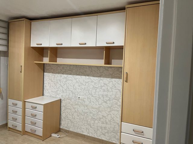 Armadi per camera da letto in legno e bianco