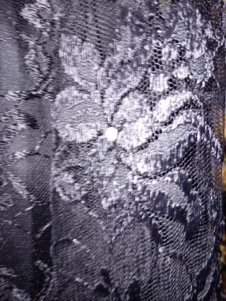 Traje de encaje negro