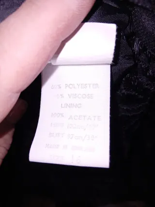 Traje de encaje negro