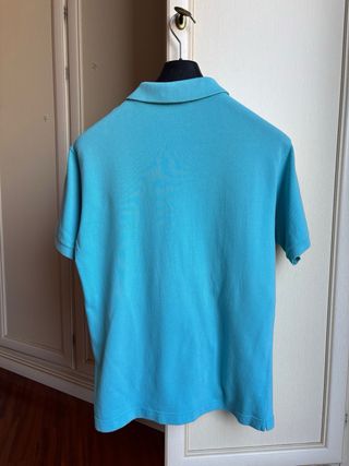 Polo Lacoste azzurra Taglia XL