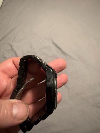 Reloj Guess Negro y Dorado