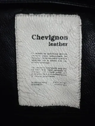 Chaqueta de cuero Chevignon negra y naranja