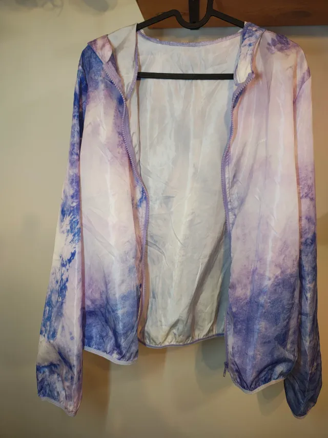 Cortavientos running sin estrenar