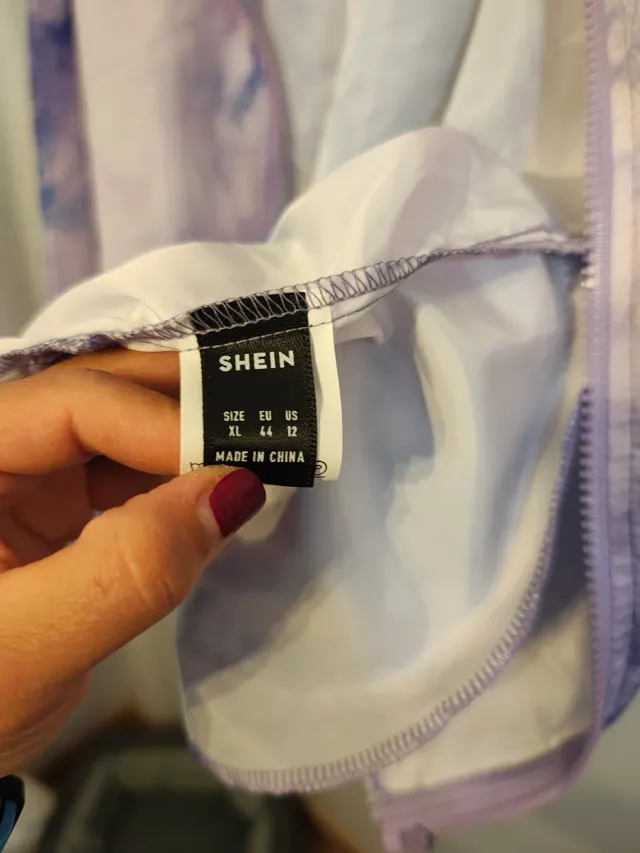 Cortavientos running sin estrenar