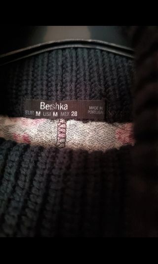 Jersey floral cuello alto