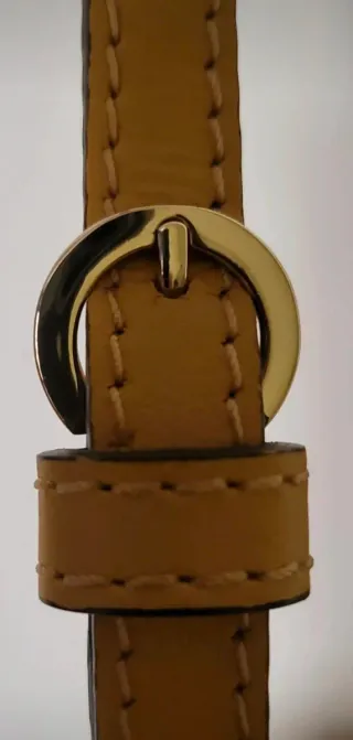 Bolso Tous dorado y amarillo con charms