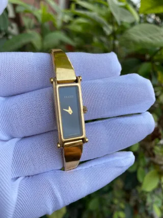 Reloj Gucci Dorado y Negro en buen