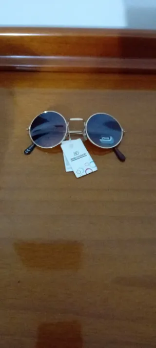 Occhiali da sole rotondi oro e marrone