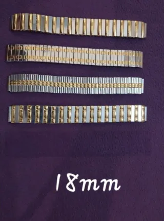 Pulseras de reloj doradas y plateadas