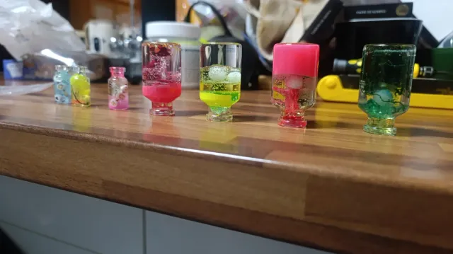 Botellas de cera de gel decorativas