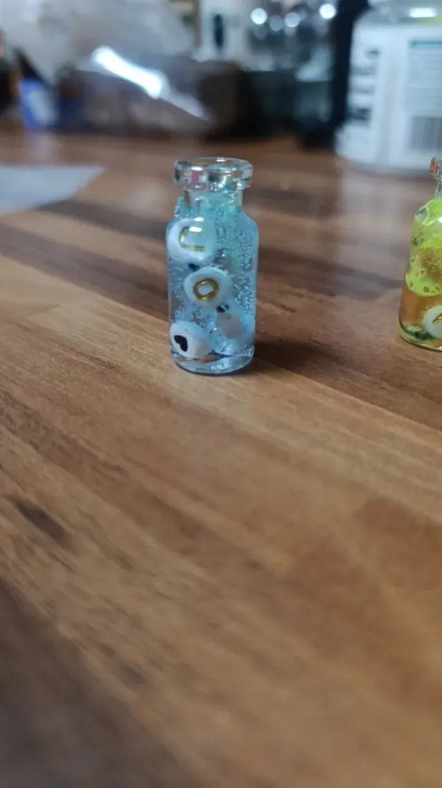 Botellas de cera de gel decorativas