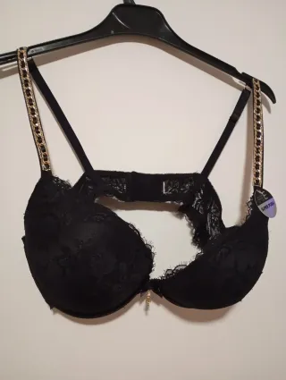 Sujetador negro con detalles dorados