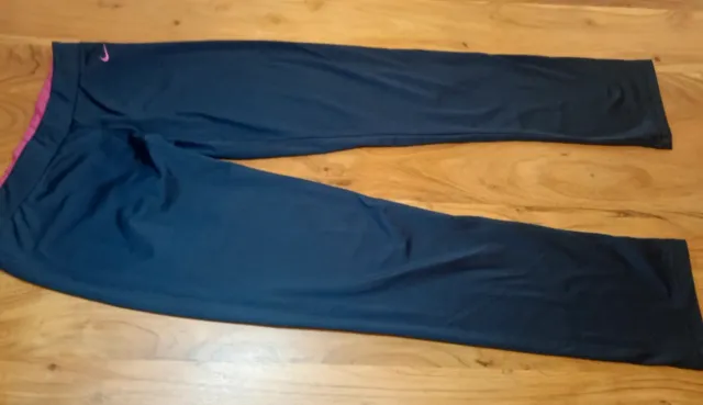 Mallas Nike azules y rosas