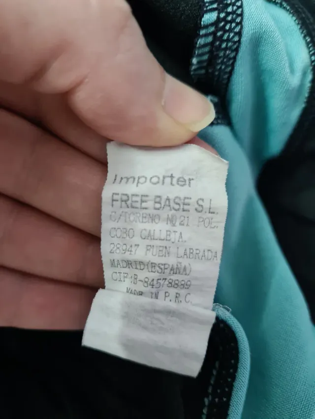 Conjunto esportivo feminino preto e turquesa