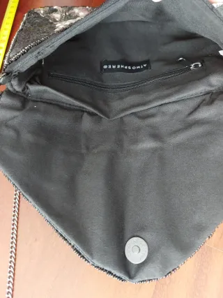 Bolso de lentejuelas negro y plateado