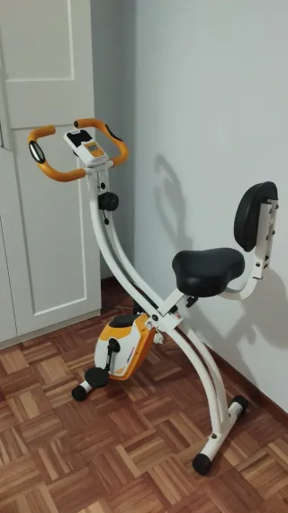 Bicicleta Estática Plegable Naranja y Blanca
