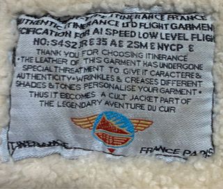 Cazadora de vuelo de piel y lana merina.