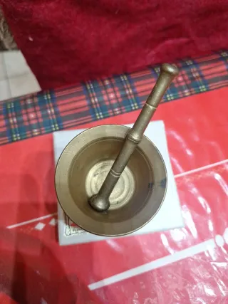 Mortaiolo e pestello in ottone