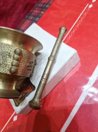 Mortaiolo e pestello in ottone