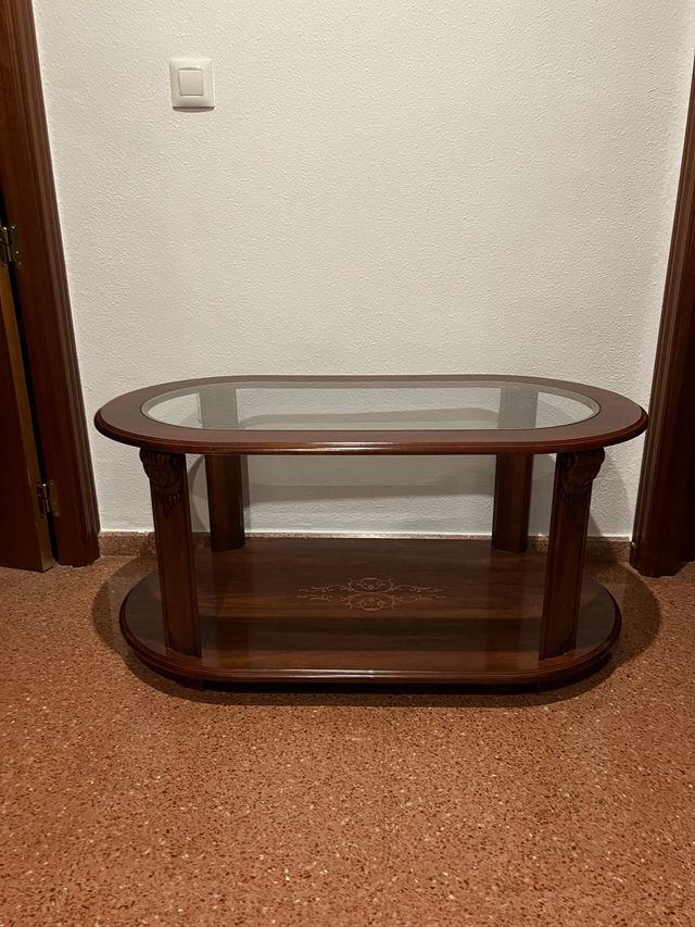 Mesa de comedor ovalada de cristal y madera