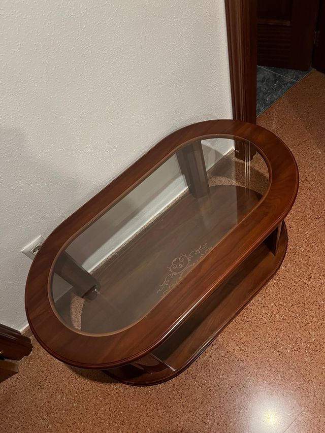 Mesa de comedor ovalada de cristal y madera