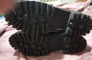 Mocasines plateados con flecos y borlas