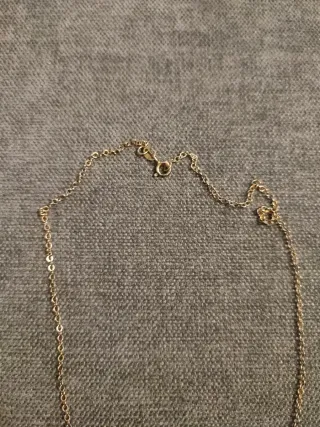 Collar con colgante de oro y plata