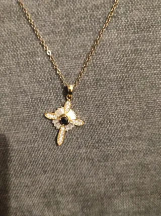 Collar con colgante de oro y plata