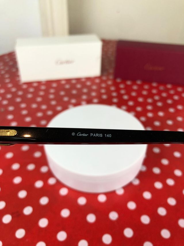 Gafas Cartier –  con montura negra y dorada