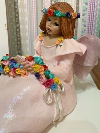 Figura decorativa ángel flores