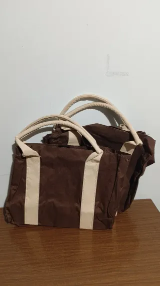 Bolsas de mano marrón y beige