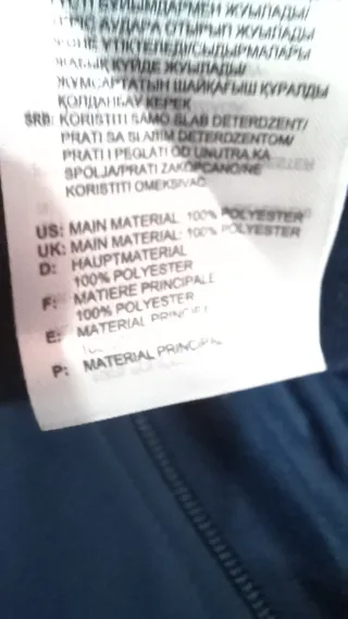 Chaqueta deportiva Adidas negra y azul