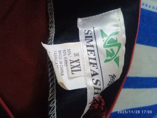 Chaleco negro con estampado oriental