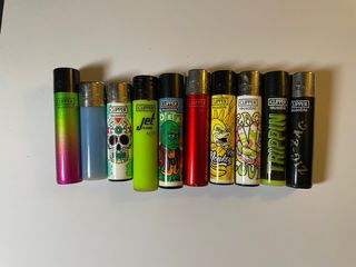 Lotto 143 accendini Clipper + Espositore