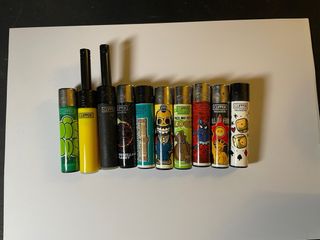 Lotto 143 accendini Clipper + Espositore